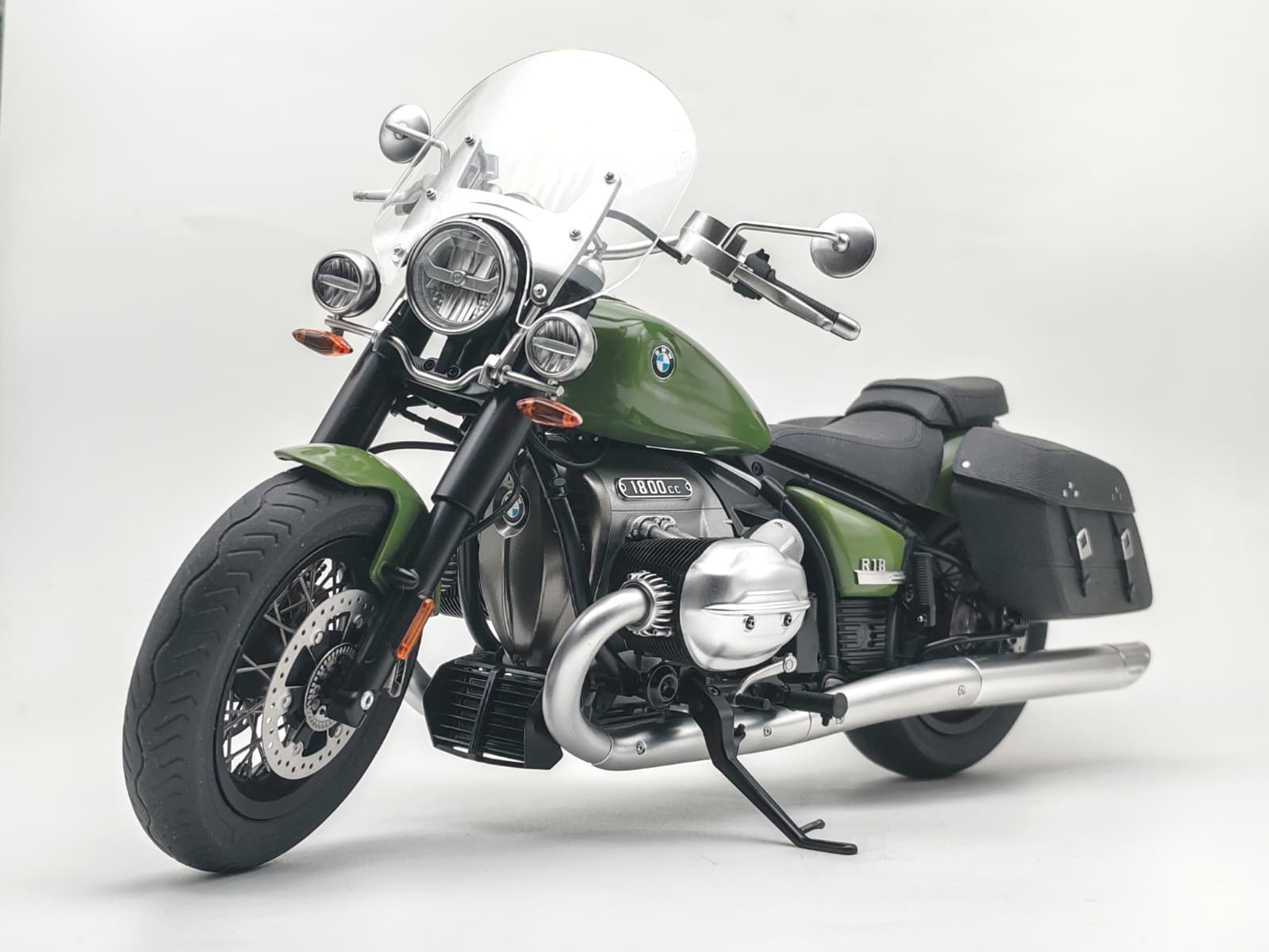 BMW R18 Classic front quarter view showing green tank and boxer engine