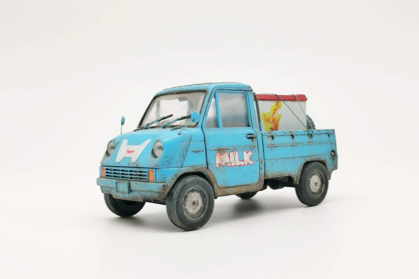 Honda T360 milk truck front quarter view